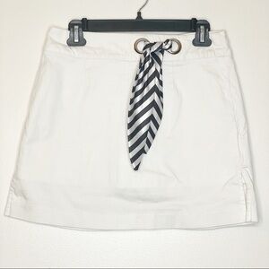 D.F.A. Petite white skirt with striped tie